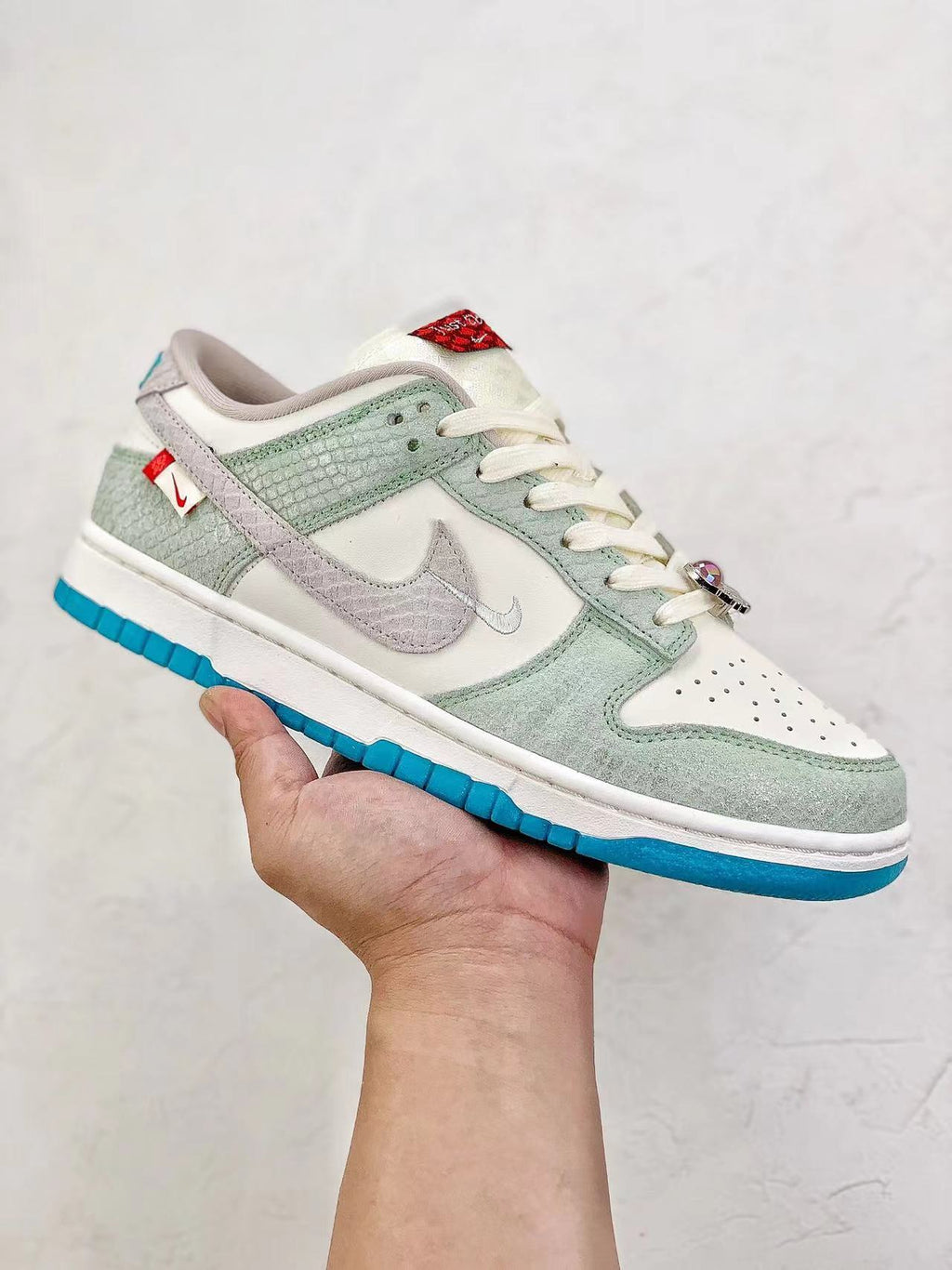 Dunk Low “Year of the Dragon” Dusty Cactus